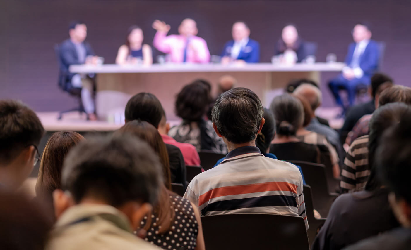 Seminar with people on stage